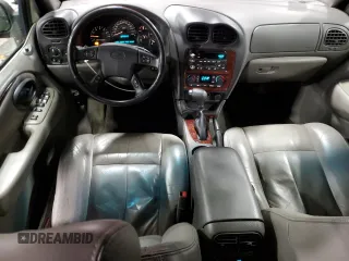 2003 Oldsmobile Bravada z VIN 1GHDT13S132216227, wystawiony jako Copart lot #84266484 z przebiegiem 156 431 mil mil oraz Szkody całkowita. Historia ofert i sprzedaży dostępna na DreamBid. Obrazek 8.