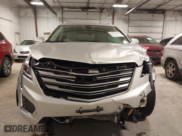 2017 Cadillac XT5 Premium Luxury AWD with VIN 1GYKNERS1HZ282954, listed as a IAAI auction lot 41217097 with 63,154 mi miles. Bid and sale history available at carsss.com. Image 13.