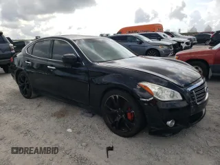 2013 Infiniti M with VIN JN1BY1AP8DM510147, listed as a Copart auction lot 58264055 with Not provided miles and Salvage title. Bid and sale history available at DreamBid. Image 4.