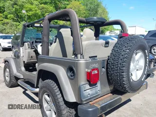 2005 Jeep Wrangler X with VIN 1J4FA39S15P305528, listed as a IAAI auction lot 42288177 with 189,767 mi miles and . Bid and sale history available at DreamBid. Image 3.