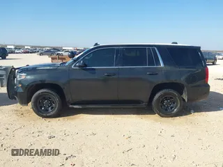 2015 Chevrolet Tahoe Commercial z VIN 1GNLC2EC7FR575386, wystawiony jako IAAI lot #41836137 z przebiegiem 143 231 mil mil oraz . Historia ofert i sprzedaży dostępna na DreamBid. Obrazek 14.