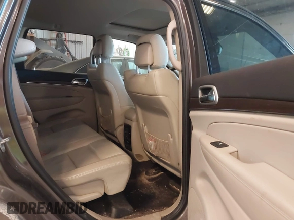 2018 Jeep Grand Cherokee Limited with VIN 1C4RJFBG9JC268479, listed as a IAAI auction lot 42032948 with 106,077 mi miles and . Bid and sale history available at DreamBid. Image 8.