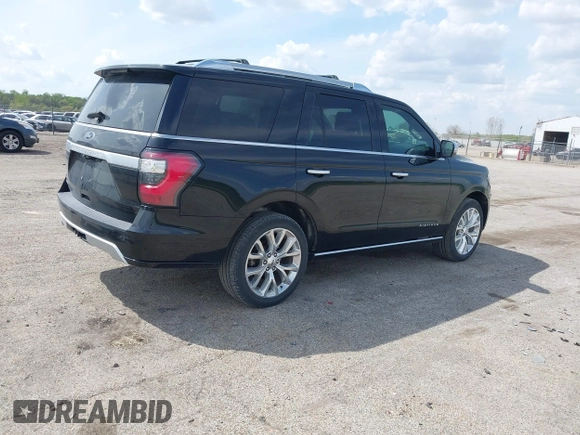 2019 Ford Expedition Platinum with VIN 1FMJU1MT2KEA09318, listed as a IAAI auction lot 42100876 with 90,330 mi miles and . Bid and sale history available at DreamBid. Image 4.