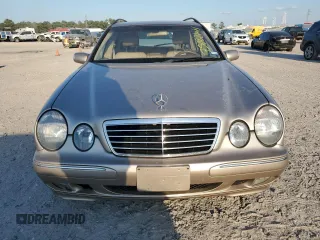 2000 Mercedes-Benz E-Class with VIN WDBJH65J4YB071699, listed as a Copart auction lot 75082144 with 105,989 mi miles and Salvage Title. Bid and sale history available at carsss.com. Image 5.