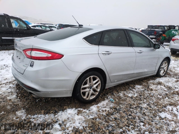 2015 Ford Fusion SE with VIN 3FA6P0HD8FR257984, listed as a Copart auction lot 83854044 with 127,600 mi miles and Salvage Title. Bid and sale history available at DreamBid. Image 3.
