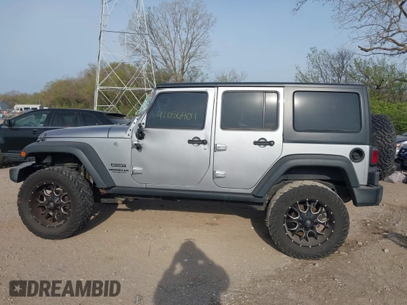 2016 Jeep Wrangler Unlimited Sport z VIN 1C4HJWDGXGL328531, wystawiony jako IAAI lot #42056907 z przebiegiem 75 871 mil mil oraz . Historia ofert i sprzedaży dostępna na DreamBid. Obrazek 14.