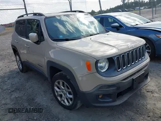2015 Jeep Renegade Latitude z VIN ZACCJBBT9FPC05106, wystawiony jako IAAI lot #42006182 z przebiegiem 101 724 mil mil oraz . Historia ofert i sprzedaży dostępna na DreamBid. Obrazek 1.