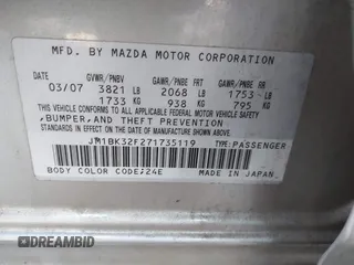 2007 Mazda 3 i Sport with VIN JM1BK32F271735119, listed as a IAAI auction lot 41446801 with 116,879 mi miles. Bid and sale history available at carsss.com. Image 9.