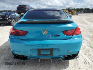 2016 BMW M6 z VIN WBS6E9C51GG437085, wystawiony jako Copart lot #78982124 z przebiegiem Nie podano mil oraz Szkody całkowita. Historia ofert i sprzedaży dostępna na DreamBid. Obrazek 6.