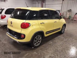 2015 FIAT 500L Urbana Trekking with VIN ZFBCFADH5FZ033844, listed as a IAAI auction lot 41186739 with 86,587 mi miles and . Bid and sale history available at DreamBid. Image 4.