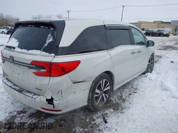 2023 Honda Odyssey Touring with VIN 5FNRL6H84PB048916, listed as a IAAI auction lot 41325052 with 50,290 mi miles and . Bid and sale history available at DreamBid. Image 4.