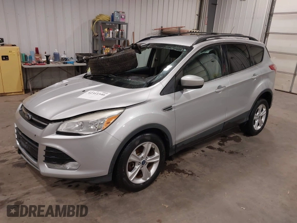 2013 Ford Escape SE with VIN 1FMCU9GX7DUB89197, listed as a IAAI auction lot 42311546 with 131,263 mi miles and . Bid and sale history available at DreamBid. Image 2.