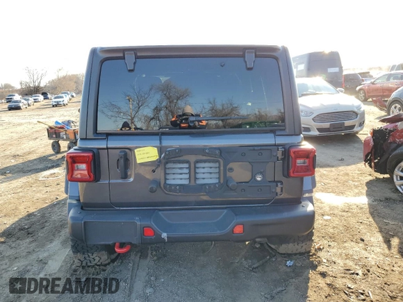 2021 Jeep Wrangler Unlimited Rubicon with VIN 1C4JJXFG8MW869995, listed as a Copart auction lot 83472254 with 48,302 mi miles and Salvage Title. Bid and sale history available at carsss.com. Image 6.