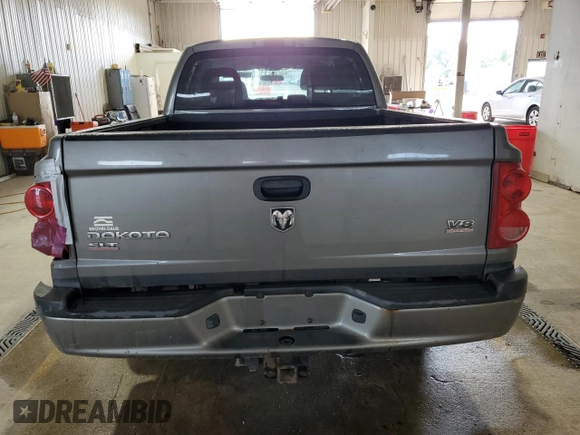 2005 Dodge Dakota SLT z VIN 1D7HW48N95S166589, wystawiony jako Copart lot #54868565 z przebiegiem 228 682 mil mil oraz Szkoda całkowita • Salvage title. Historia ofert i sprzedaży dostępna na DreamBid. Obrazek 6.