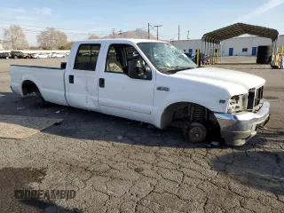 2001 Ford F-350 XL with VIN 1FTSW30S21ED10763, listed as a Copart auction lot 42611925 with 208,484 mi miles and Salvage Title. Bid and sale history available at DreamBid. Image 4.