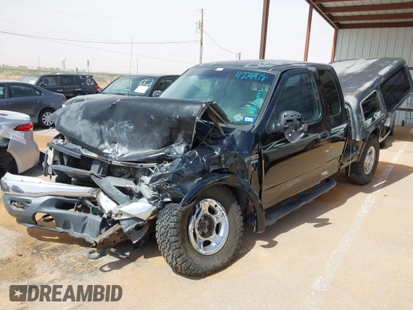1999 Ford F-150 XL with VIN 1FTRX08L3XKB12260, listed as a IAAI auction lot 42244781 with Not provided miles and . Bid and sale history available at DreamBid. Image 16.