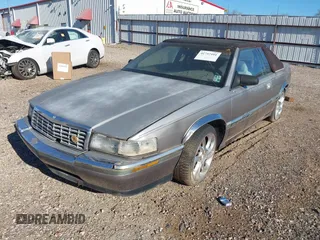 1992 Cadillac Seville z VIN 1G6EL13B2N0612154, wystawiony jako IAAI lot #41757101 z przebiegiem Nie podano mil oraz . Historia ofert i sprzedaży dostępna na DreamBid. Obrazek 2.