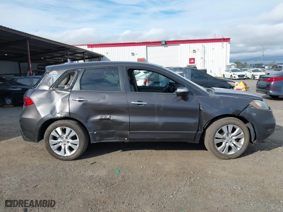 2010 Acura RDX Tech Pkg with VIN 5J8TB1H5XAA001201, listed as a IAAI auction lot 41648209 with 162,810 mi miles. Bid and sale history available at carsss.com. Image 13.