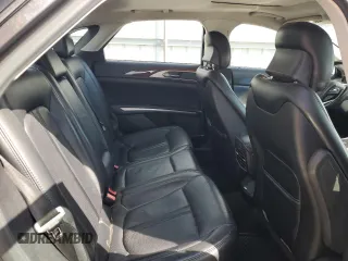 2015 Lincoln MKZ z VIN 3LN6L2JKXFR600669, wystawiony jako Copart lot #51130115 z przebiegiem 75 176 mil mil oraz Szkoda całkowita • Salvage title. Historia ofert i sprzedaży dostępna na DreamBid. Obrazek 10.