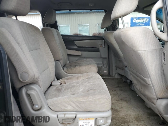 2013 Honda Odyssey EX z VIN 5FNRL5H40DB033400, wystawiony jako Copart lot #50552155 z przebiegiem 223 770 mil mil oraz Nie do naprawy. Historia ofert i sprzedaży dostępna na DreamBid. Obrazek 11.