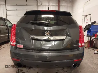 2014 Cadillac SRX with VIN 3GYFNAE34ES665630, listed as a IAAI auction lot 41315281 with 99,009 mi miles and . Bid and sale history available at DreamBid. Image 16.