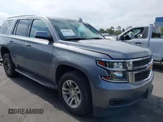 2018 Chevrolet Tahoe LS with VIN 1GNSCAEC2JR306131, listed as a IAAI auction lot 42338873 with 107,652 mi miles and . Bid and sale history available at DreamBid. Image 1.