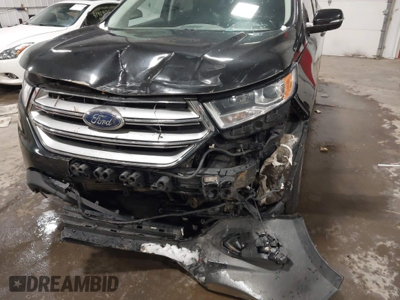 2015 Ford Edge Titanium z VIN 2FMTK4K91FBB27482, wystawiony jako IAAI lot #41919347 z przebiegiem 177 268 mil mil oraz . Historia ofert i sprzedaży dostępna na DreamBid. Obrazek 6.