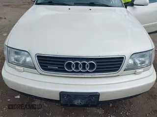 1996 Audi A6 z VIN WAUJA84A9TN106938, wystawiony jako IAAI lot #42287751 z przebiegiem 163 427 mil mil oraz . Historia ofert i sprzedaży dostępna na DreamBid. Obrazek 6.
