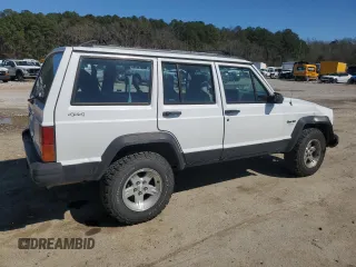 1995 Jeep Cherokee Sport with VIN 1J4FJ68S0SL646747, listed as a Copart auction lot 48772675 with 239,834 mi miles and Salvage title. Bid and sale history available at DreamBid. Image 3.