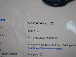 2023 Tesla Model 3 with VIN 5YJ3E1EA3PF678825, listed as a IAAI auction lot 41283153 with 8,607 mi miles. Bid and sale history available at carsss.com. Image 7.