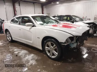 2011 Dodge Charger RT Plus with VIN 2B3CM5CT1BH555608, listed as a IAAI auction lot 41491944 with 140,081 mi miles. Bid and sale history available at carsss.com. Image 1.