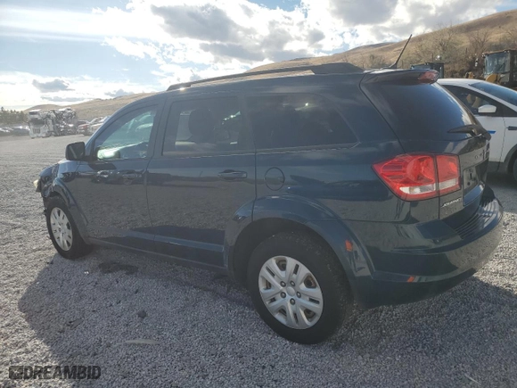 2015 Dodge Journey American Value Pkg with VIN 3C4PDCAB3FT737029, listed as a Copart auction lot 80396454 with 133,169 mi miles and Salvage Title. Bid and sale history available at carsss.com. Image 2.