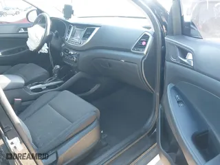 2017 Hyundai Tucson Value with VIN KM8J33A24HU343231, listed as a IAAI auction lot 41395327 with 133,017 mi miles. Bid and sale history available at carsss.com. Image 5.