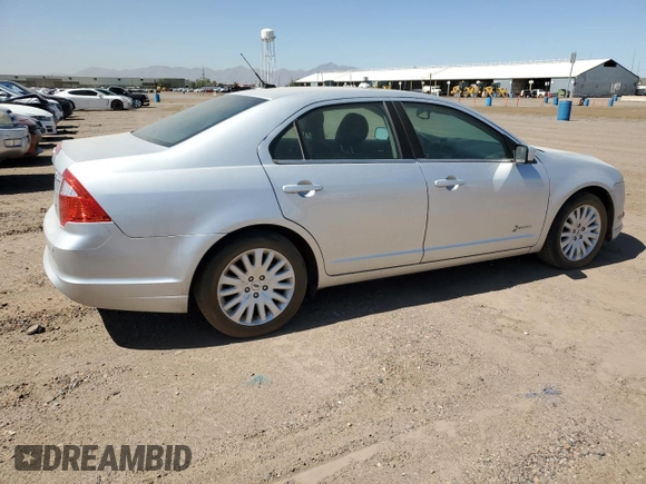 2011 Ford Fusion Hybrid с VIN 3FADP0L36BR251407, выставлен на аукционе Copart как лот 57838085 с пробегом 129 972 миль миль и Чистый • Clean title. История ставок и продаж доступна на DreamBid. Изображение 3.