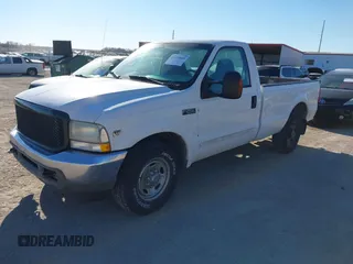 2002 Ford Super Duty F-250 XL with VIN 1FTNF20L12EB69721, listed as a IAAI auction lot 41324860 with 232,751 mi miles. Bid and sale history available at carsss.com. Image 2.