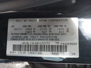 2011 Mazda Mazda3 i Touring with VIN JM1BL1VFXB1472772, listed as a IAAI auction lot 42180030 with 128,438 mi miles. Bid and sale history available at carsss.com. Image 9.
