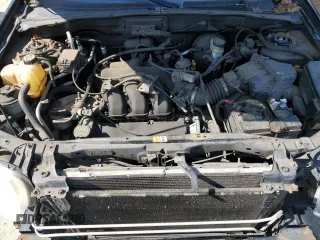 2004 Ford Escape Limited with VIN 1FMCU94154KB50085, listed as a Copart auction lot 50404455 with 180,249 mi miles and Salvage Title. Bid and sale history available at carsss.com. Image 12.