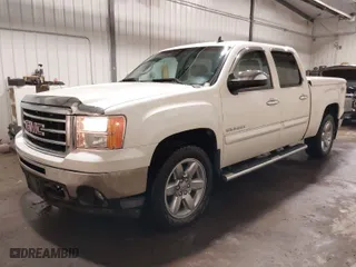 2013 GMC Sierra 1500 SLT with VIN 3GTP2WE76DG197565, listed as a IAAI auction lot 41344388 with 134,972 mi miles. Bid and sale history available at carsss.com. Image 2.