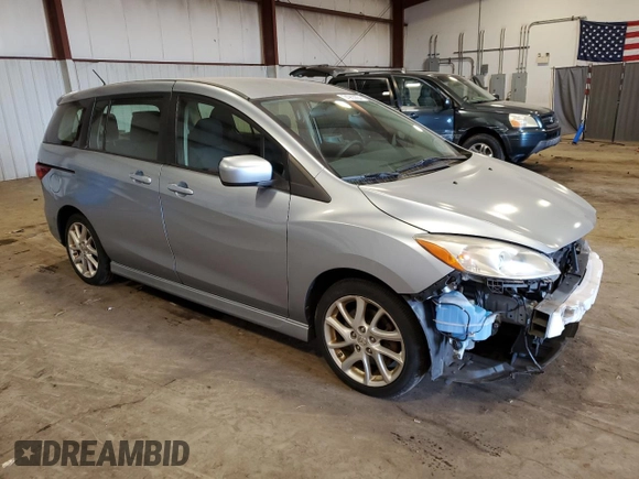 2012 Mazda 5 Touring with VIN JM1CW2CL0C0105090, listed as a Copart auction lot 74963864 with 88,759 mi miles and Salvage Title. Bid and sale history available at DreamBid. Image 4.