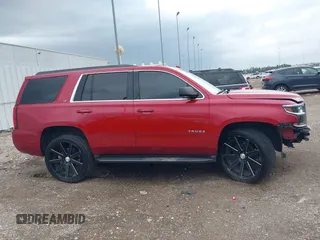 2015 Chevrolet Tahoe LT with VIN 1GNSCBKC1FR721605, listed as a IAAI auction lot 42184896 with 200,983 mi miles and . Bid and sale history available at DreamBid. Image 14.