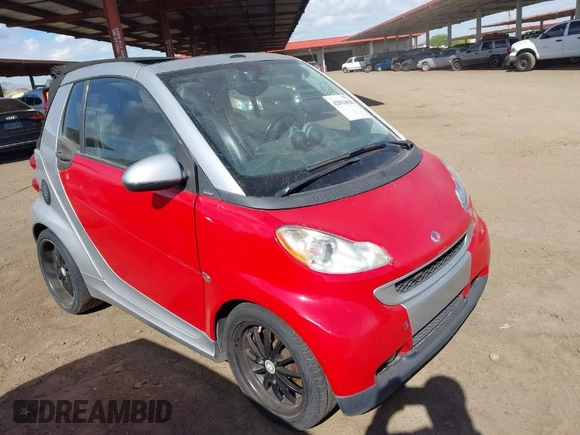 2009 Smart fortwo Passion with VIN WMEEK31X99K294322, listed as a IAAI auction lot 42014658 with Not Provided miles. Bid and sale history available at carsss.com. Image 1.
