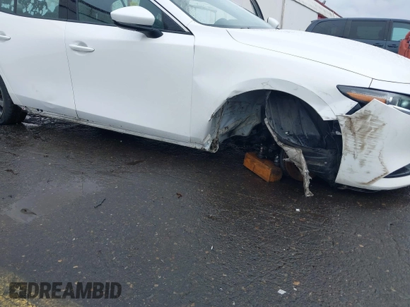 2020 Mazda 3 Premium with VIN 3MZBPBEMXLM133357, listed as a IAAI auction lot 41540234 with 81,280 mi miles and . Bid and sale history available at DreamBid. Image 6.