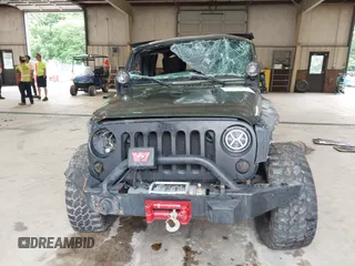 2007 Jeep Wrangler X z VIN 1J4GA39107L132865, wystawiony jako IAAI lot #42252972 z przebiegiem 101 114 mil mil oraz . Historia ofert i sprzedaży dostępna na DreamBid. Obrazek 13.