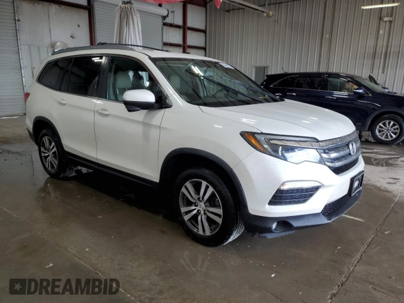 2018 Honda Pilot EX-L with VIN 5FNYF6H58JB040611, listed as a Copart auction lot 63614525 with 148,656 mi miles and Salvage title. Bid and sale history available at DreamBid. Image 4.