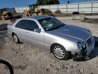 2002 Mercedes-Benz E-Class with VIN WDBJF82J42X077731, listed as a Copart auction lot 70280584 with 169,018 mi miles and Salvage Title. Bid and sale history available at carsss.com. Image 4.