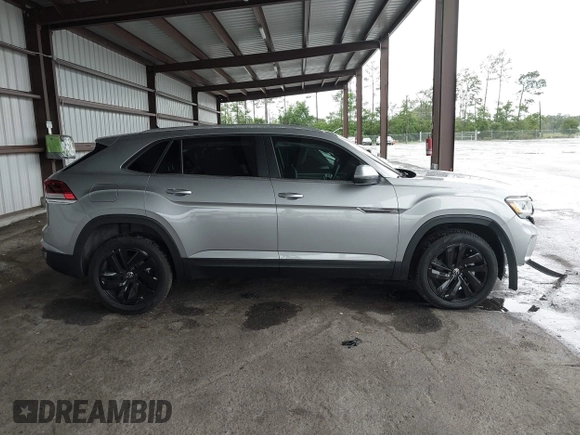 2023 Volkswagen Atlas SE z VIN 1V2HE2CA0PC222291, wystawiony jako IAAI lot #42431536 z przebiegiem 23 114 mil mil oraz . Historia ofert i sprzedaży dostępna na DreamBid. Obrazek 14.