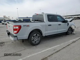 2023 Ford F-150 XL with VIN 1FTEW1CP4PKF86851, listed as a Copart auction lot 50611185 with 15,773 mi miles and Salvage Title. Bid and sale history available at DreamBid. Image 3.