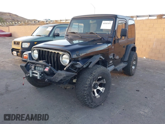 2004 Jeep Wrangler SE with VIN 1J4FA29184P762210, listed as a IAAI auction lot 40983051 with 107,525 mi miles and . Bid and sale history available at DreamBid. Image 2.