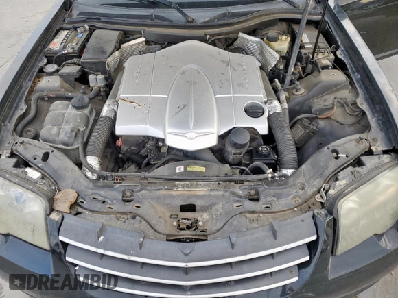 2004 Chrysler Crossfire z VIN 1C3AN69L54X006853, wystawiony jako Copart lot #50780575 z przebiegiem Nie podano mil oraz Tytuł czysty. Historia ofert i sprzedaży dostępna na DreamBid. Obrazek 11.
