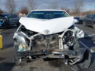 2014 Toyota Sienna SE with VIN 5TDXK3DC1ES422510, listed as a IAAI auction lot 41030376 with Not Provided miles and . Bid and sale history available at DreamBid. Image 13.